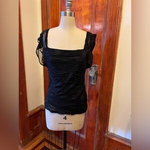 Ripped style black blouse by Vivienne Tam